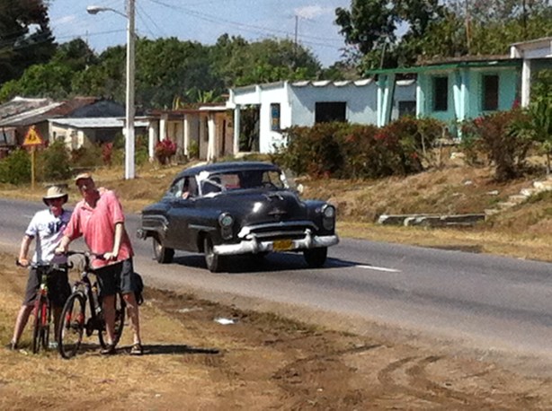 Alex and Steve on a highway in Cuba